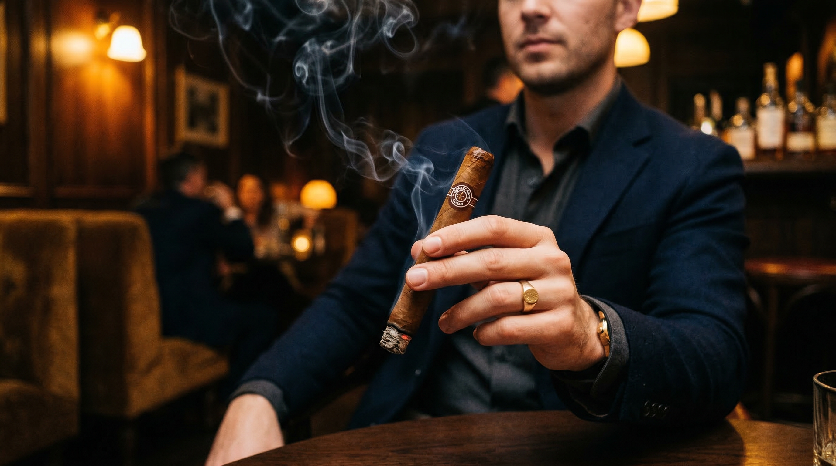 Hand elegantly holding a lit Cuban cigar with smoke wisps in a lounge setting